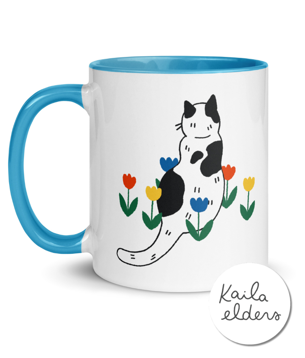 “In the Garden” cat mug by Kaila Elders | Charity mug for animal lovers
