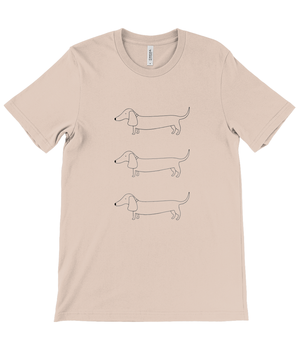 Peach unisex t-shirt. Design on front shows 3 outline drawings of sausage dogs, in a column one above the other.